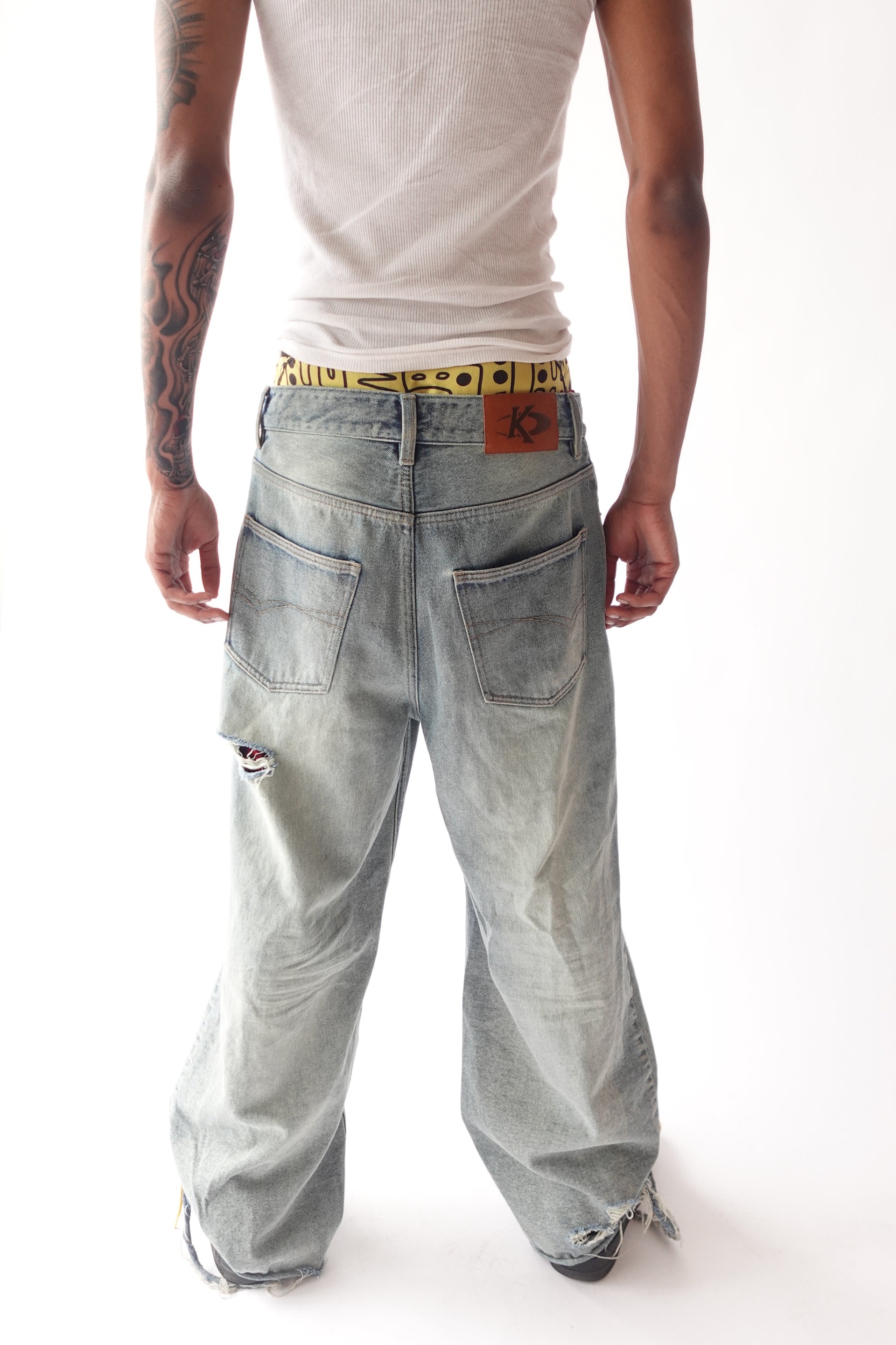 Uncut Denim Jeans